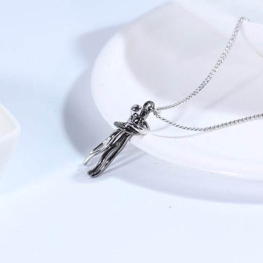 Couple hugging necklace