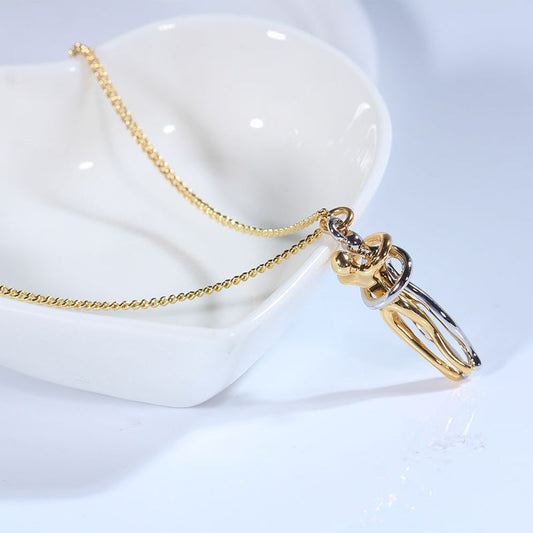 Couple hugging necklace