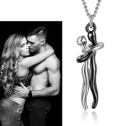 Couple hugging necklace