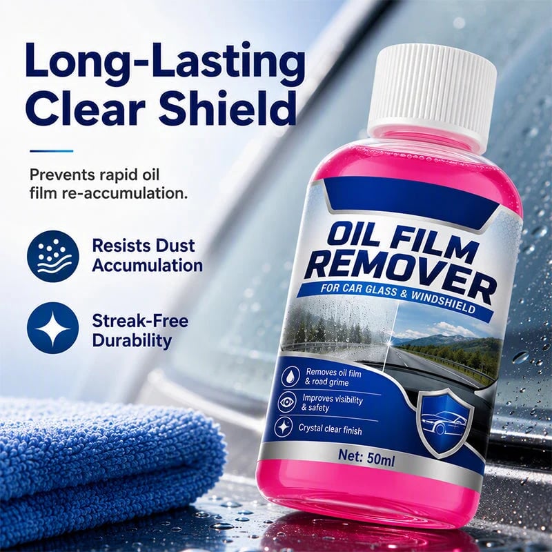 Bottle of car glass oil film remover next to microfiber cleaning cloth